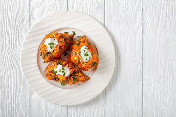 Healthy meal: sweet potato stuffed with chicken