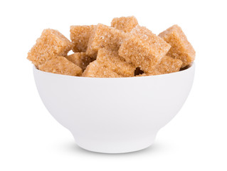 Brown sugar in a white bowl isolated on white background