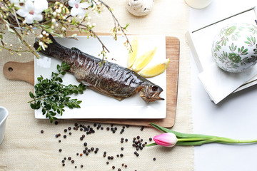 Trout. Baked fish, served with a green salad.
Exquisite, tasty dinner dish. Serving suggestions, culinary photography.