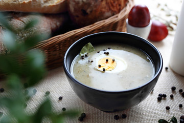 White borscht with egg. Traditional Easter dish. Traditional Easter dishes, serving suggestions, culinary photography.