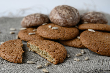 tasty oatmeal cookies and chocolate gingerbread cookies front view close-up