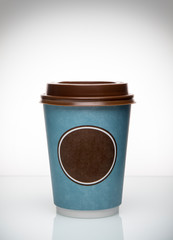 
Plastic cup of coffee on a white background