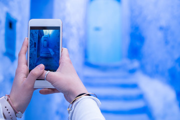 Girl taking a photo with her phone