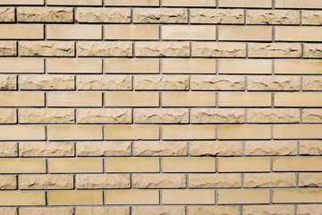 Yellow brick wall. Brick wall background.