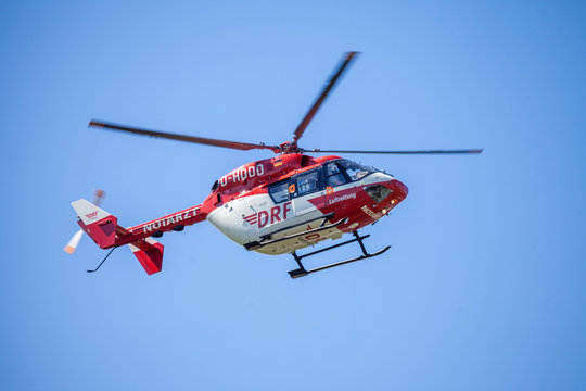 DELMENHORST / GERMANY - MAY 06, 2018: Eurocopter BK-117 from DRF Luftrettung flies over landing side. Notarzt means emergency doctor.