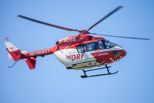 DELMENHORST / GERMANY - MAY 06, 2018: Eurocopter BK-117 from DRF Luftrettung flies over landing side. Notarzt means emergency doctor.