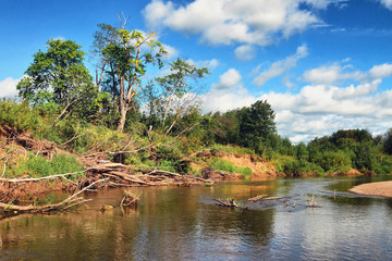 Kama, a taiga forest river deep in the northern forests. Summer day in the headwaters of a stormy river.