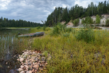 Kama, a taiga forest river deep in the northern forests. Summer day in the headwaters of a stormy...