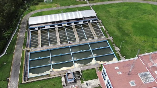 Aerial top view recirculation solid contact clarifier sedimentation tank, Water treatment plant Quito