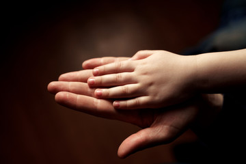  palms of adult and child