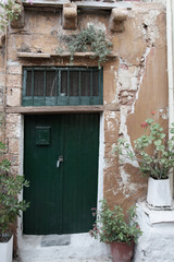 Fototapeta na wymiar Old vintage traditional wooden doors of Greek islands, Santorini, Greece