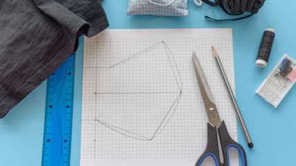 how to make a protective face mask at home from fabric, creating a markup pattern for sewing a mask, step-by-step instructions, step 1