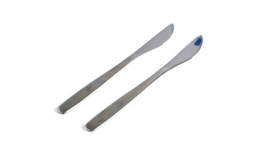 Dessert knives on a white background