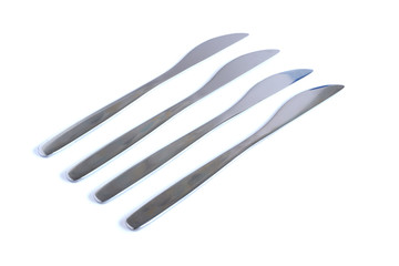 Dessert knives on a white background