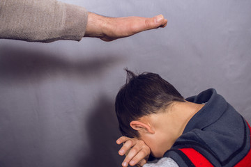 angry man beat sad boy