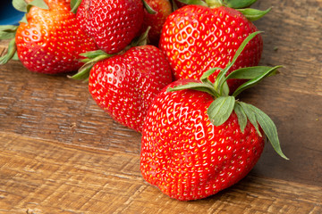 strawberries on wooden table