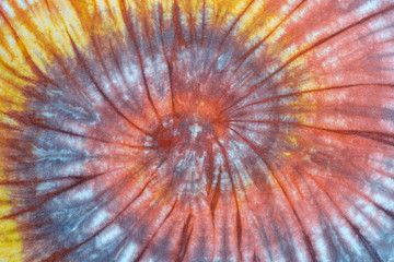 swirl tie dye pattern hand dyed on cotton fabric abstract texture background.