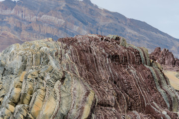 Colourful rocks in east Greenland close up. Rock texture.