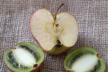 sliced kiwi  and a apple