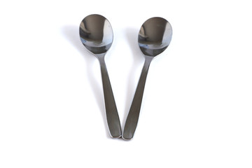Dessert spoons on a white background