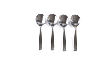 Dessert spoons on a white background