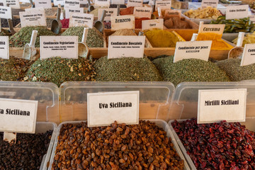 Variety of spices and dried herbs in the local market of Ortigia island in province of Syracuse in Sicily