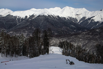 Fototapeta na wymiar Mountain peaks in the area of Rosa Khutor ski resort in Sochi