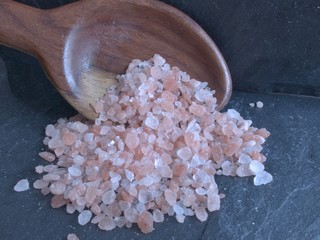 Himalayan salt in a wooden spoon