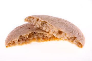 Oatmeal cookies with beze on white background