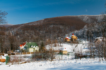 Snow-covered winter village in the Carpathian mountains