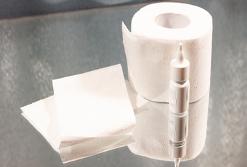 toilet paper and nose drops