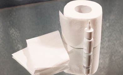 toilet paper and nose drops