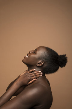 Profile Portrait Of Carefree Young Woman With Head Back