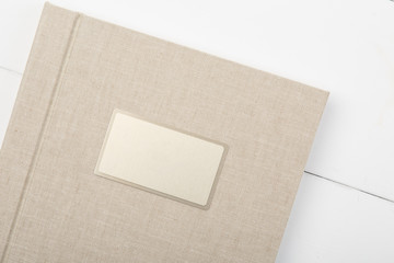 Elegant beige book and box for it. Wedding photobook. Wedding photo album