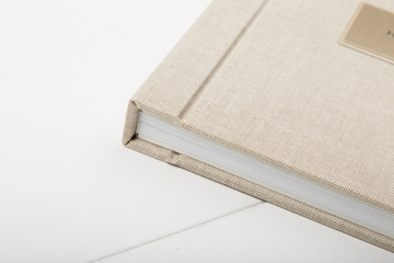 Elegant beige book and box for it. Wedding photobook. Wedding photo album