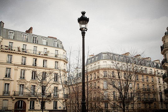 nostalgic image of paris street with building and lamp horizontal