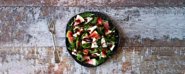 Healthy salad with watermelon and arugula. Diet food. watermelon salad.