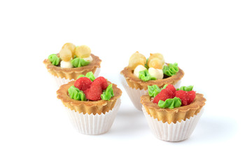 Cakes with cream and berry jam