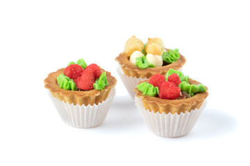 Cakes with cream and berry jam