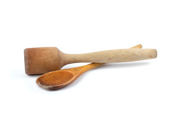 Wooden spoon and pestle for cooking in the kitchen