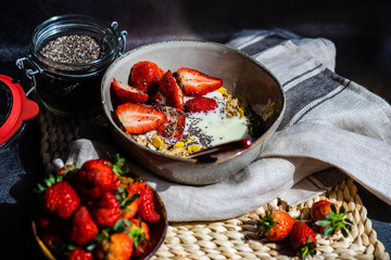 Healthy breakfast concept with oatmeal and strawberry