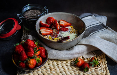 Healthy breakfast concept with oatmeal and strawberry