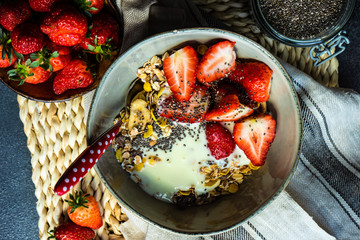 Healthy breakfast concept with oatmeal and strawberry