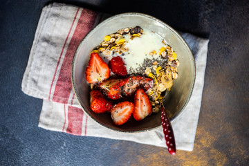 Fototapeta na wymiar Healthy breakfast concept with oatmeal and strawberry
