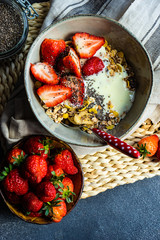 Healthy breakfast concept with oatmeal and strawberry