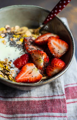 Healthy breakfast concept with oatmeal and strawberry