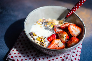 Healthy breakfast concept with oatmeal and strawberry