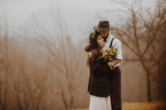 Gorgeous Bride And Stylish Groom, Boho Wedding Couple, Luxury Ceremony At Mountains With Amazing View, Space For Text