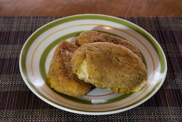 
battered rice croquettes stuffed with cheese