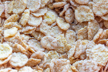 Their flakes are poured a lot. Texture. A plate. Close-up